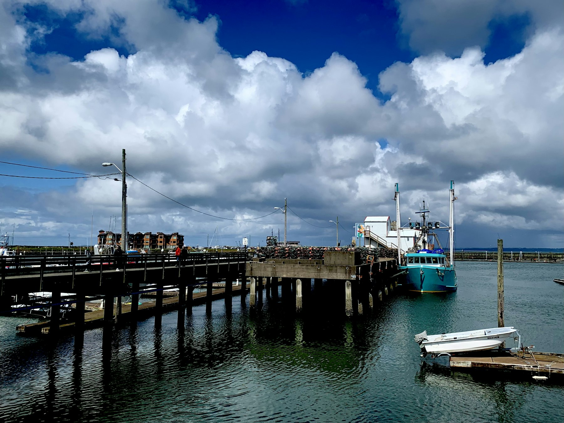 A working fishing dock at Masset under a big coastal sky